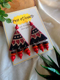 RED TRIKON EARRINGS