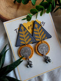 YELLOW TRIKON EARRINGS