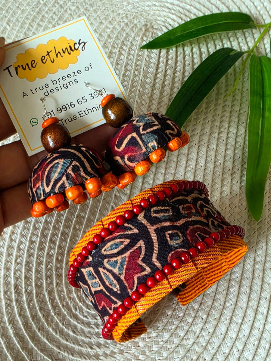orange beaded zhumki with handcuff